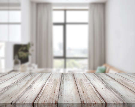 Wooden textured desk with blur interior. Concept table and fonの写真素材