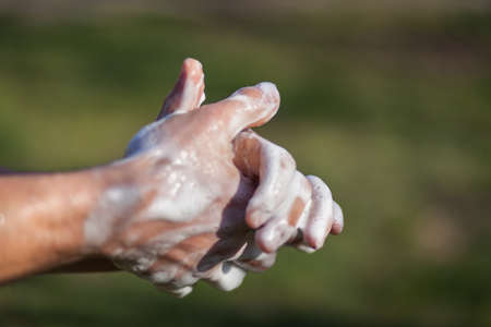 Disinfection prevention of viral diseases. Man's hands are washed