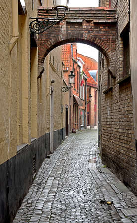 Medieval street in Bruges, Belgiumの写真素材