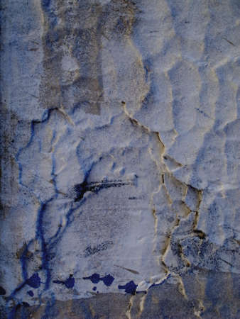 Old blue wall stained with blue paint.の写真素材