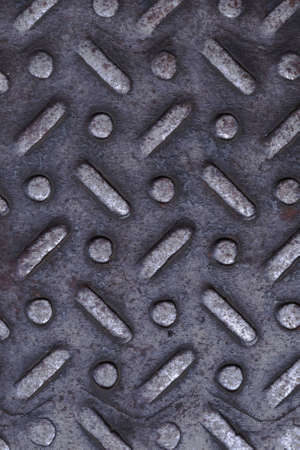 Metal with embossed dots and sticks, different gray.の写真素材