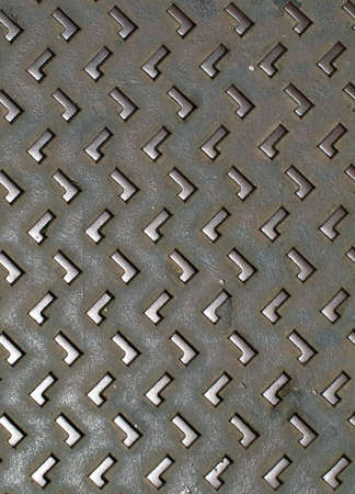 Embossed Metal forming a Zigzag, can also be seen as letters L.の写真素材