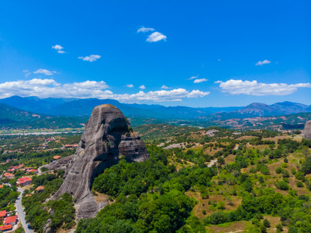 Greece. The historical region of Thessaly. Rocks of Meteora. View of the Thessalian Plain. popular tourist spot. drone. aerial view. The camera moves forwardの写真素材