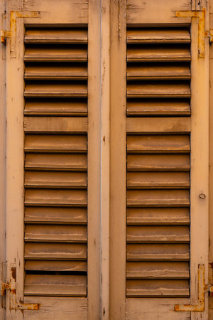 Facade window of an old European Mediterranean town. close-up. Textureの写真素材