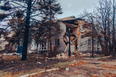 Administrative building damaged by shelling. War in Ukraine. Russian invasion of Ukraine. Destruction of infrastructure. Terror of the civilian population. war crimesの写真素材