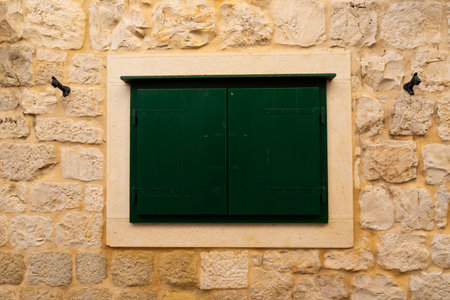 Facade window of an old European Mediterranean town. close-up. Textureの写真素材