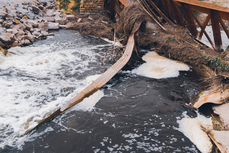 Bridge on the river, destroyed by the water flow. Catastrophe, natural disaster, flood. Destruction...
