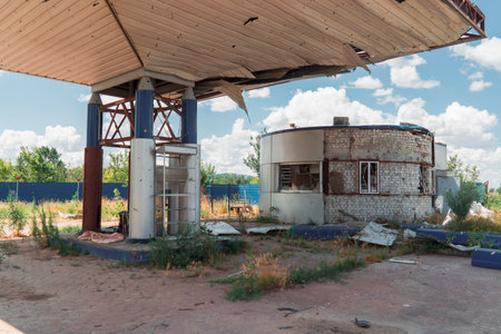 Gas station damaged by shelling. War in Ukraine. Russian invasion of Ukraine. Destruction of infrastructure. war crimesの写真素材