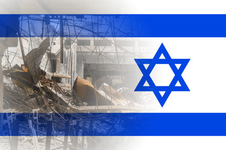 A destroyed residential building against the background of the Israeli flag. Israeli-Palestinian conflict. Terror of civiliansの写真素材