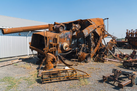 Damaged agricultural equipment destroyed by artillery fire. War in Ukraineの写真素材