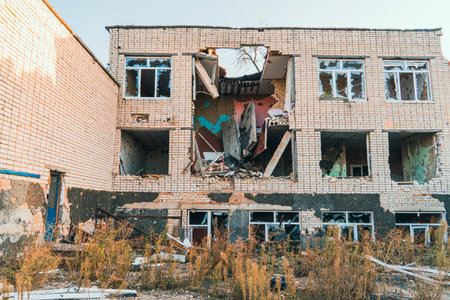 The school was damaged by shelling. War in Ukraineの写真素材