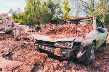 Damaged civilian car after missile strike. Terror of civilians.