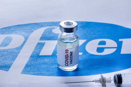 Covid-19 Coronavirus vaccine bottle and syringe
