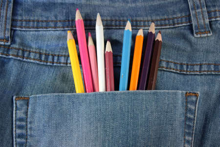 Colored pencils lay in a pocketの写真素材