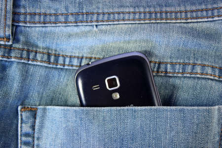 Black phone in your pocketの写真素材