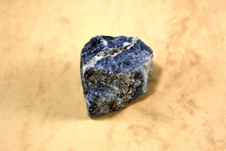 A mineral Beryl on a light background