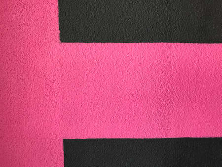 texture of red granular wall. grainy surface texture. the grainy texture of the red wall. the grainy...