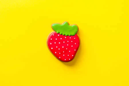 space for text gingerbread strawberries on a yellow background flatlyの写真素材