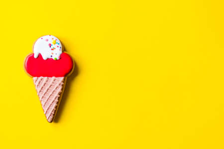 gingerbread ice cream on a yellow background. High quality photo place for textの写真素材