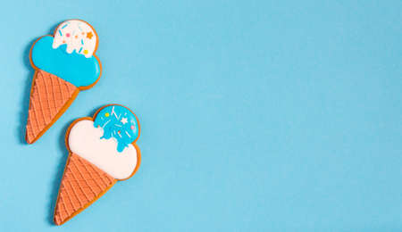 gingerbread on a blue background. High quality photo Flatly place for textの写真素材