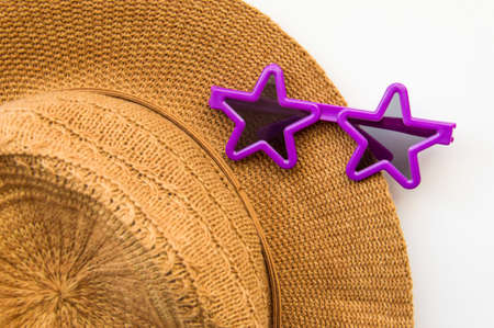summer hat and sunglasses in the form of stars. High quality photoの写真素材