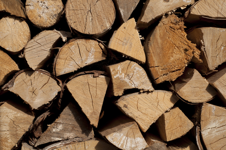 Stack of firewood for heating. Horizontal image.