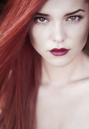 fashion portrait of redhead girl closeupの写真素材