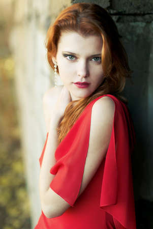 beautiful girl in red dressの写真素材