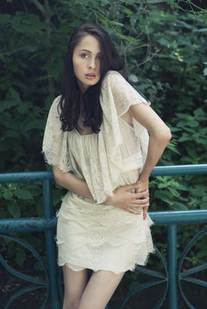 beautiful brunette posing outdoorsの写真素材