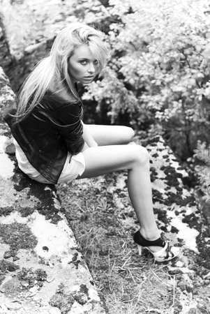 beautiful blonde sad outdoorsの写真素材