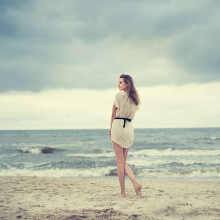 beautiful blonde on the ocean の写真素材