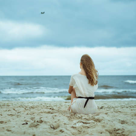 picture of beautiful girl on the ocean 