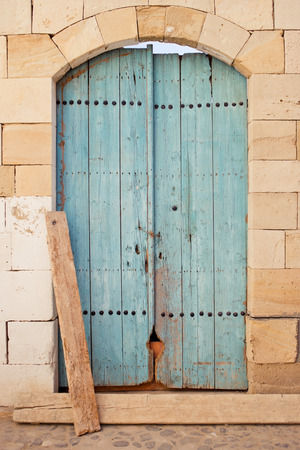 Blue wooden door of an old store in Limassol Cyprus. Horizontal imageの写真素材