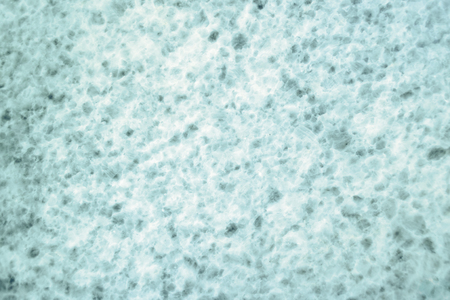 Slightly lightened slices marble background. Horizontal image. Cold turquoise colors. Beautiful close up background. Ideal for sites, banners, brochures, designの写真素材