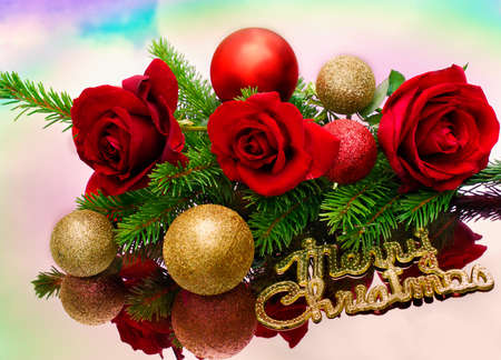  roses and golden baubles are on a mirror tableの写真素材