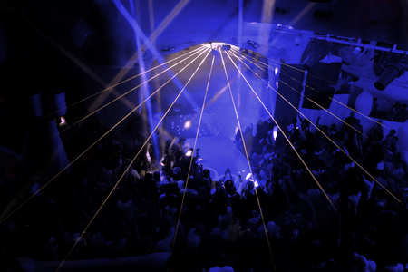 Night club dj party people enjoy of music dancing sound with colorful light.