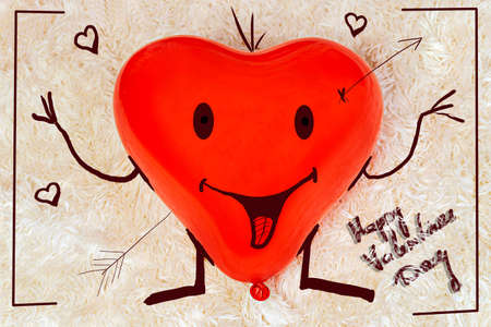 funny valentine painted red balloon heartの写真素材