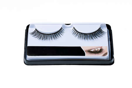 Pair of false eyelashes in a box on a white backgroundの写真素材