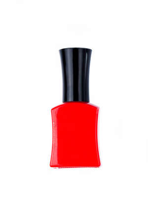 red nail polish bottle on white backgroundの写真素材