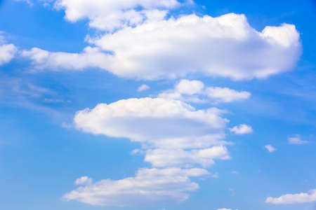 blue sky with fluffy clouds in daylightの写真素材