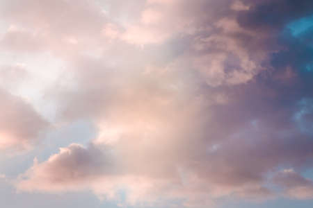 abstract coloured sky with clouds, backgroundの写真素材