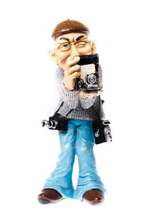 funny statuette of an old, vintage photographer with multiple cameras in operation