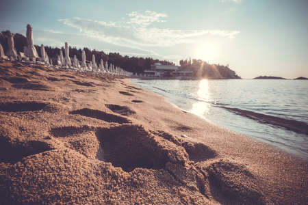 Sunrise on the beach, Kavala town, Greeceの写真素材