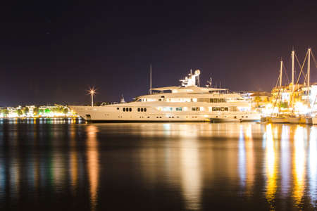 luxurious modern private yacht at the pier at night. Zakynthos, Greeceの写真素材