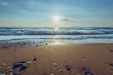 Sunrise on the beach, Rafina town, Greece