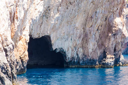 Blue sea caves on Zakynthos island, Greece, with crystal clear watersの写真素材