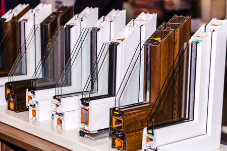 profile of a plastic window, a section of a multi-compartment double-glazed window close-upの写真素材