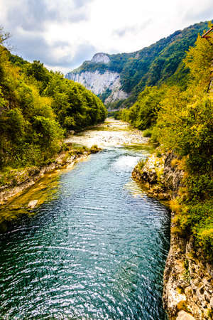 a view of the river which is among the mountainsの写真素材