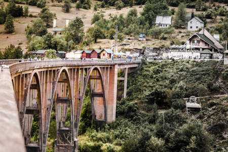 29 august 2017 unidentified people are walking along the bridge, the canyon of the Tara River,...