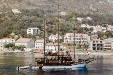 ship on the background of coastal architecture in Montenegroのeditorial素材